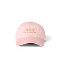 Lolita Cap in baby pink with 'I eat books for breakfast' embroidered on the front